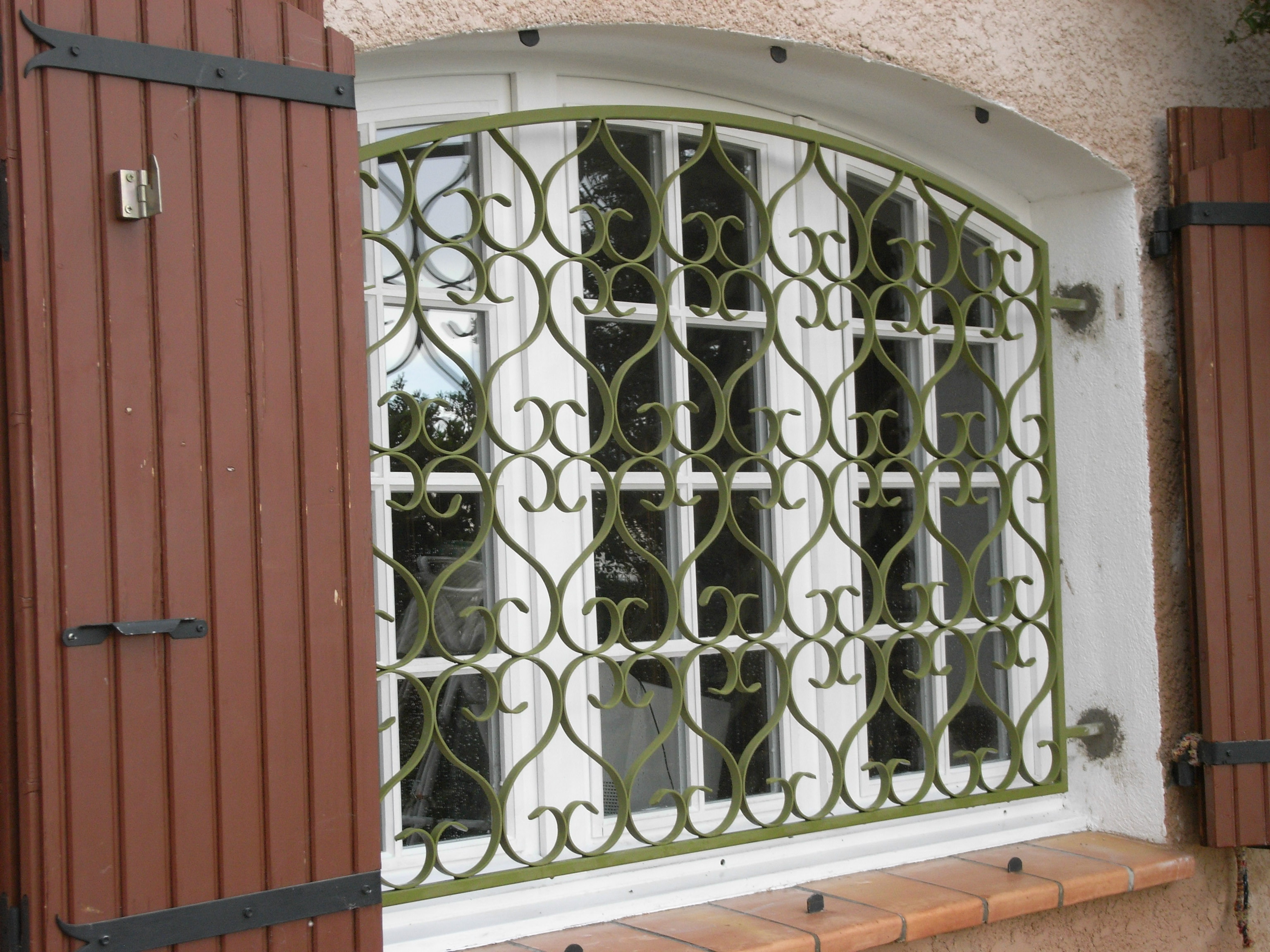 Grille de défense pour fenêtre
